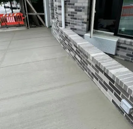 Repaired NYC sidewalk with new flags and clean expansion joints