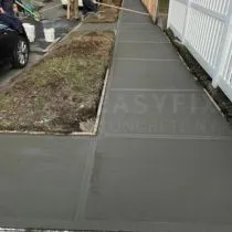 Sidewalk repair around a tree pit on a residential street
